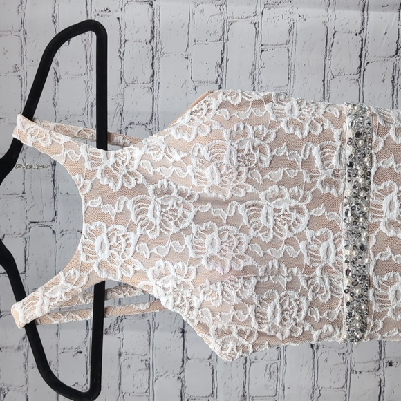 Long Lace Dress with Cutaway Bodice and Slit Skirt - Picture 2 of 14